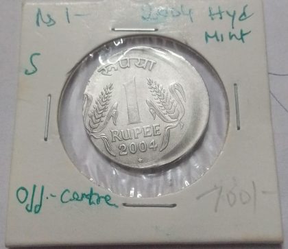 1 RUPEE 2004 HYDERABAD MINT OFF CENTRE -ERROR COIN USED