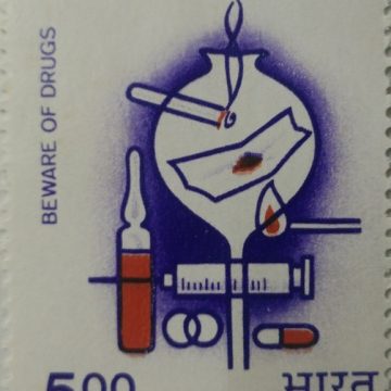 Beware of Drugs Drugs, Conference, Narcotics, Addiction, Habituation, Ampoule, Injection, Syringe, Capsule, Match Stick, Flask, Cigarette, Pills - MNH Stamp