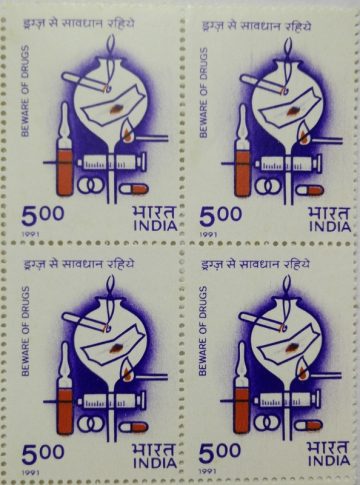 Beware of Drugs Drugs, Conference, Narcotics, Addiction, Habituation, Ampoule, Injection, Syringe, Capsule, Match Stick, Flask, Cigarette, Pills (Block of 4 stamp)